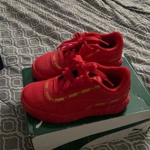 Kids puma size 12.5 red and gold